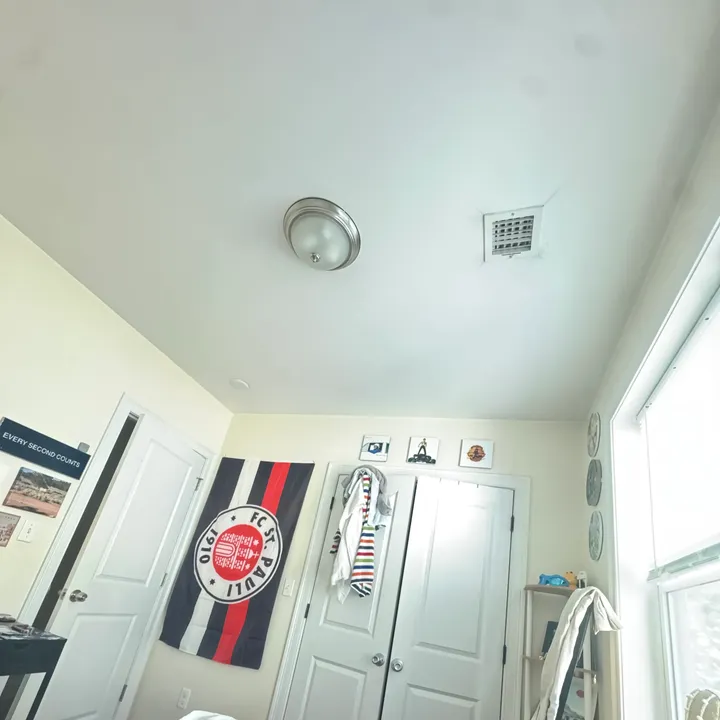 My brother’s apartment, with the sign just visible on the left wall
